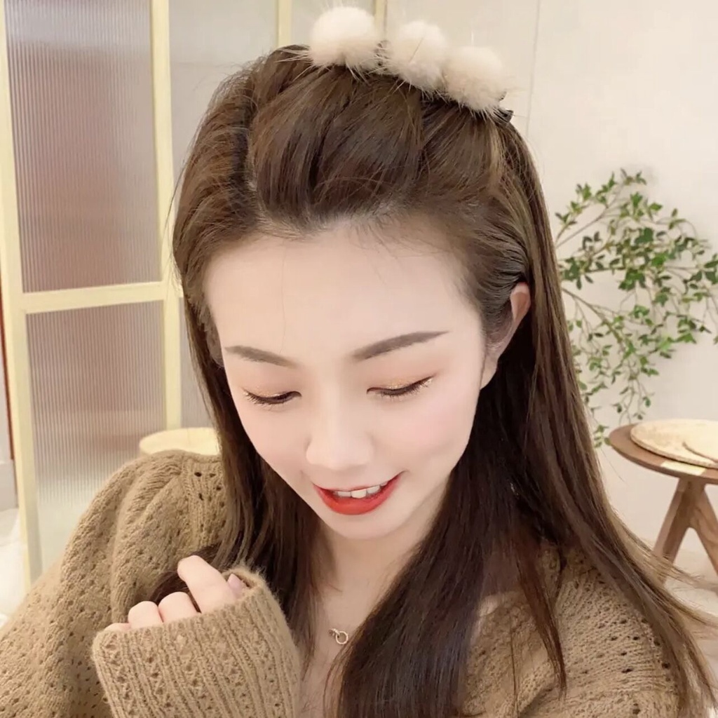 Kẹp tóc đính quả bông xinh xắn