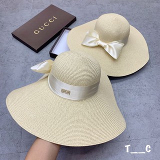Mũ đi biển rộng vành nơ lụa