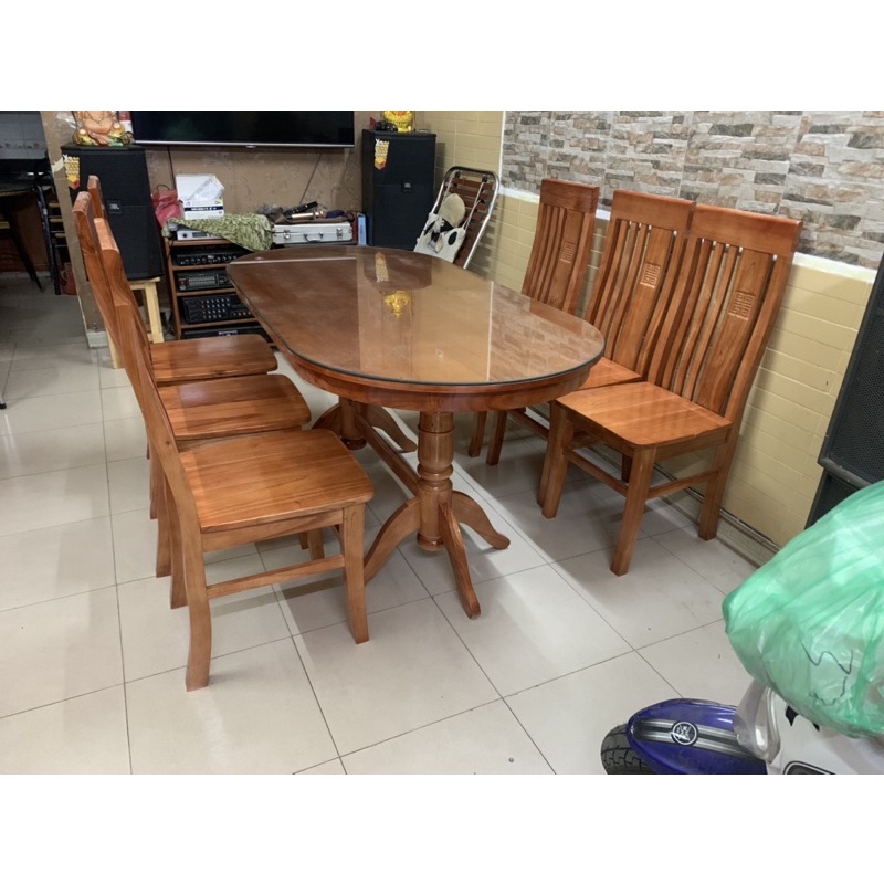 Bàn ăn mặt đặc bầu dục gỗ Xoan ta