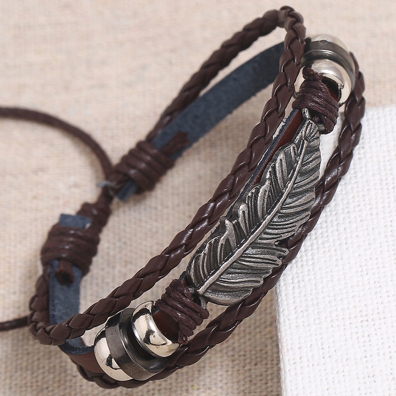 Vòng Đeo Tay Da Handmade Cánh Thiên Thần Unisex Nhiều Sợi