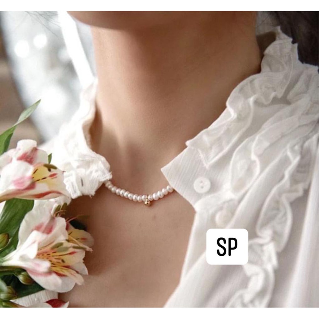 Vòng cổ hột châu thật charm bạc xi vàng