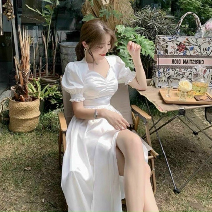 Đầm maxi cổ tim xẻ tà tay ngắn ,tay phồng có mút ngực chất liệu đũi nhăn 1 màu như hình (trắng)