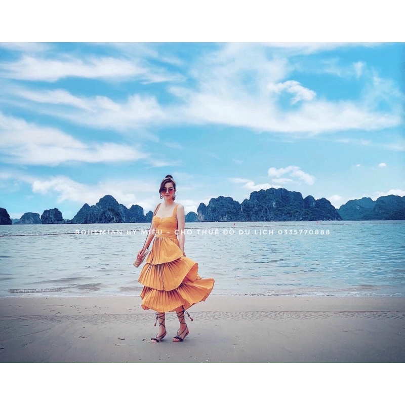 G9  - đầm xoè vàng dập tầng nơ vai