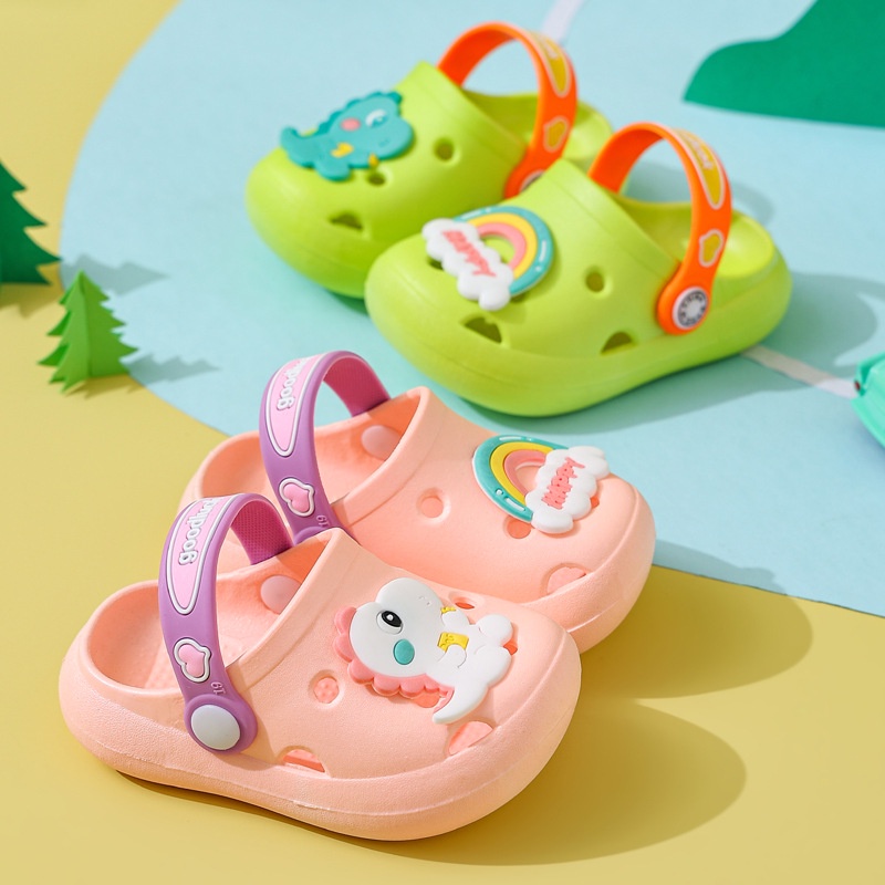 SANITKUN Giày bít mũi khoét lỗ mang trong nhà chống trượt họa tiết khủng long hoạt hình dễ thương dành cho trẻ em