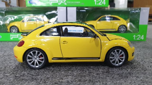 Xe mô hìnhVolkswagen Beetle 2013&lt;br&gt;Tỉ lệ : 1:24 Hãng sản xuất : Welly ( Vàng )