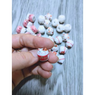 QT MÈO GỐM THẦN TÀI 2x1,5cm [HỎA TÓC]