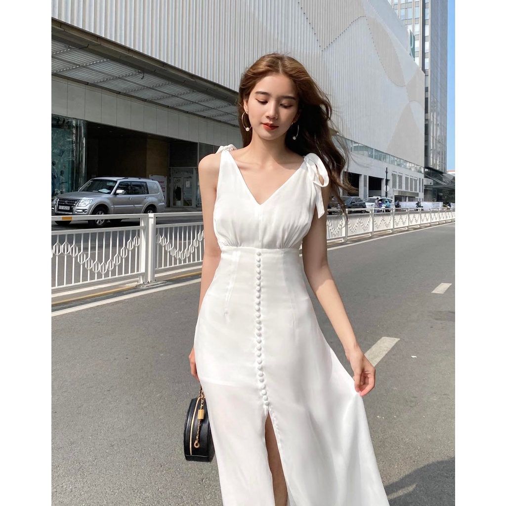 Đầm lụa 2 dây xẻ tà đính nút thủ công nơ vai ROY DRESS (Trắng)