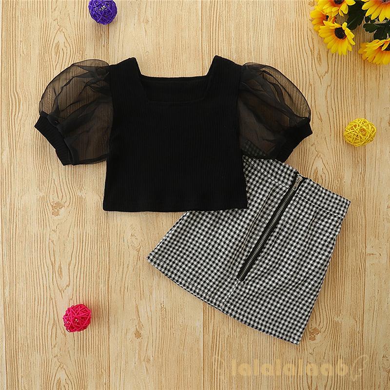 Set Áo Tay Ngắn Phồng Cổ Vuông Màu Đen + Chân Váy Chữ A Họa Tiết Caro Cho Bé Gái