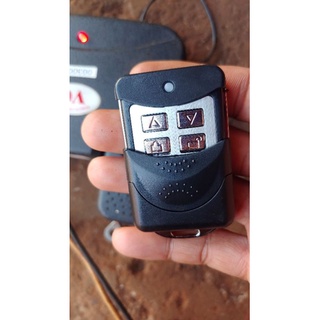 Tay điều khiển cửa cuốn mã gạt 433 mhz