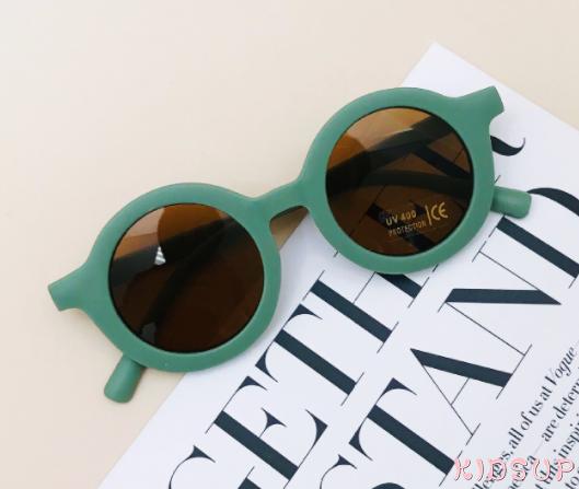 Kính mát gọng tròn dễ thương cho bé