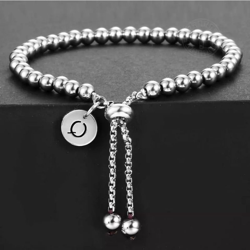 Lắc tay bi inox kiểu dây rút gắn charm tròn (có khắc theo yêu cầu)