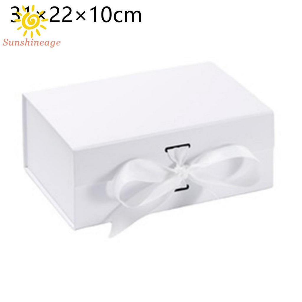 Hộp quà chất liệu dày cứng cỡ 23 * 17 * 7cm có nam châm kèm dây ruy băng