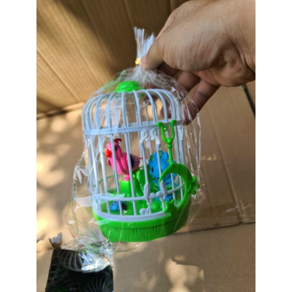 Lồng chim. Xài pin.