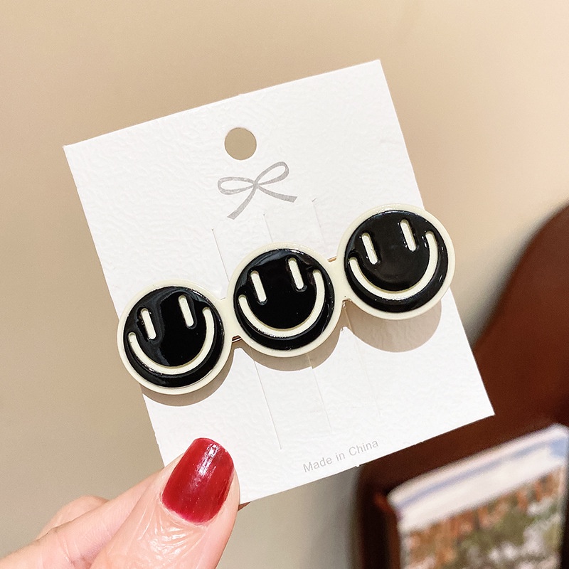 Kẹp tóc caro đen trắng