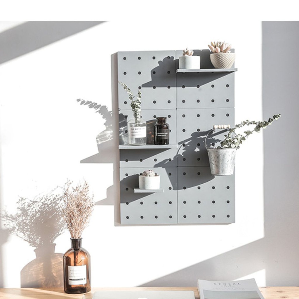 Bảng Pegboard dùng để treo dụng cụ và trang trí tường