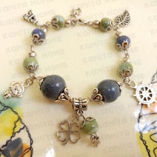Vòng hạt gốm mix charm