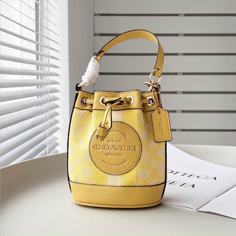 TÚI COACH DEMPSEY BUCKET MINI C8322