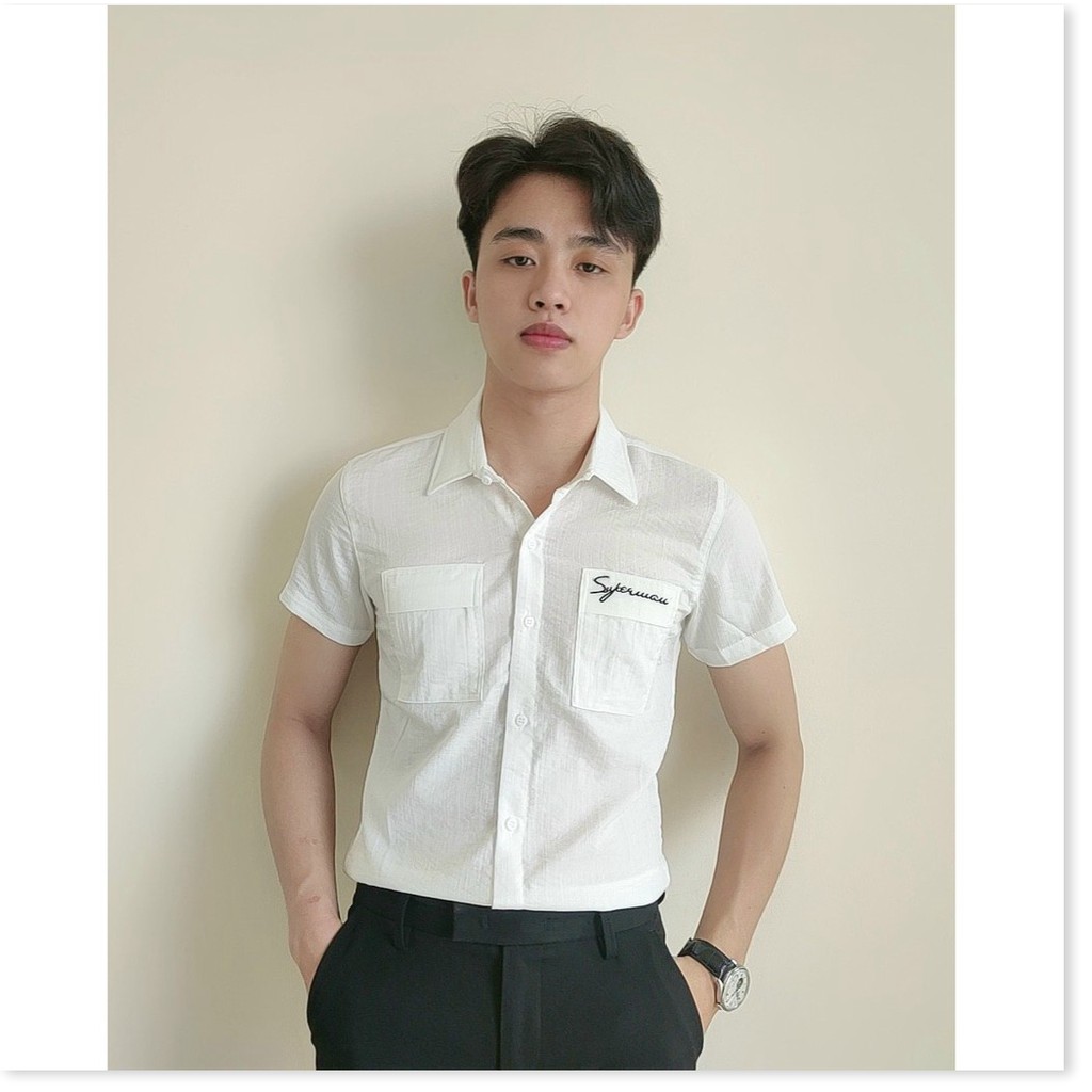 ÁO SƠ MI ĐŨI TAY NGẮN,THIẾT KẾ HỌA TIẾT TRƠN NHƯNG KHÔNG KÉM PHẦN SANG TRỌNG,ĐẶC BIỆT LÀ CHẤT LIỆU VÃI THOÁNG MÁT VÀ MỊM