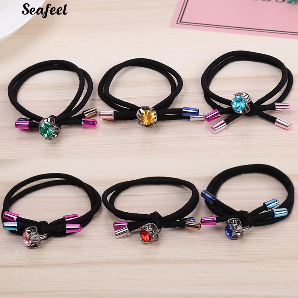 Thun cột tóc đính đá.