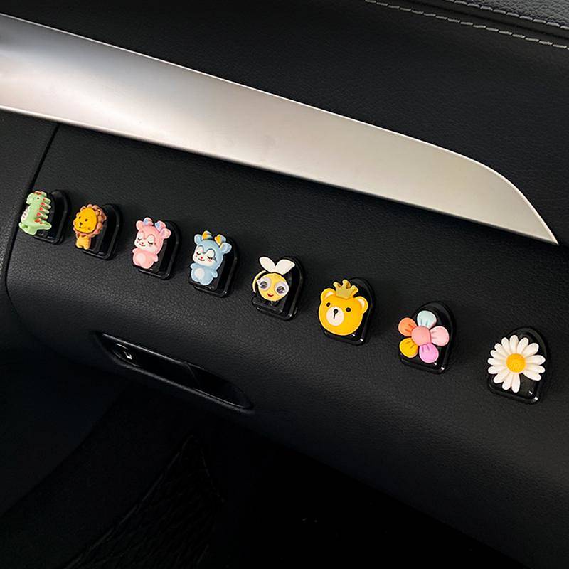 Móc treo đồ gắn phía trước ghế xe hơi thiết kế hoạt hình đáng yêu tiện lợi