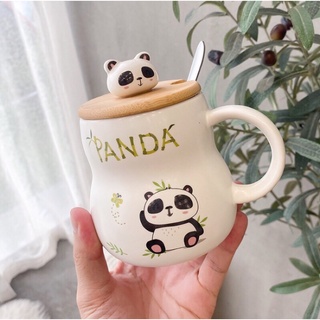 Cốc sứ panda có nắp và thìa.