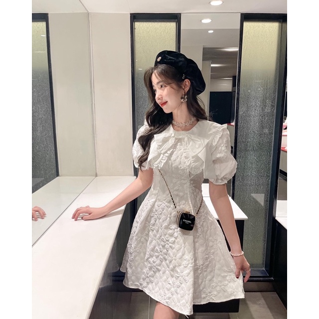 Váy gấm cổ hoa nơ
