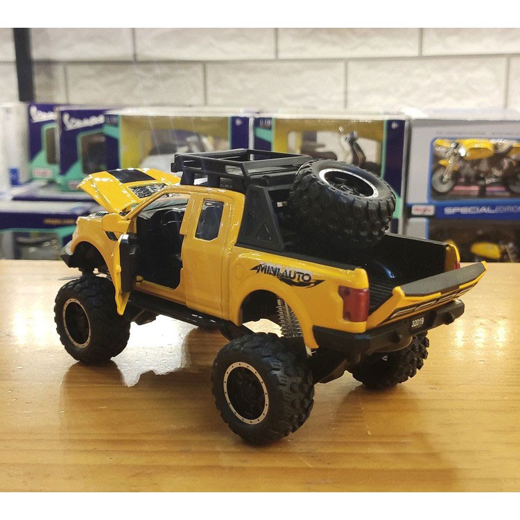 MÔ HÌNH XE Ô TÔ FORD F150 Raptor Offroad đúc Kim Loại - tỷ lệ 1:32 Vàng