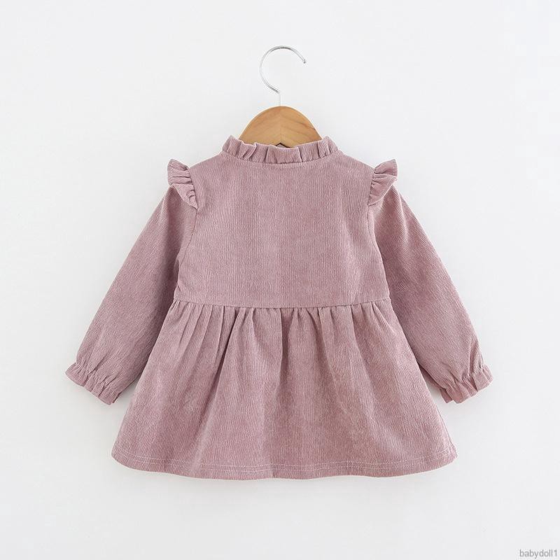 Đầm thun dài tay màu trơn kèm túi đeo chéo thời trang cho bé