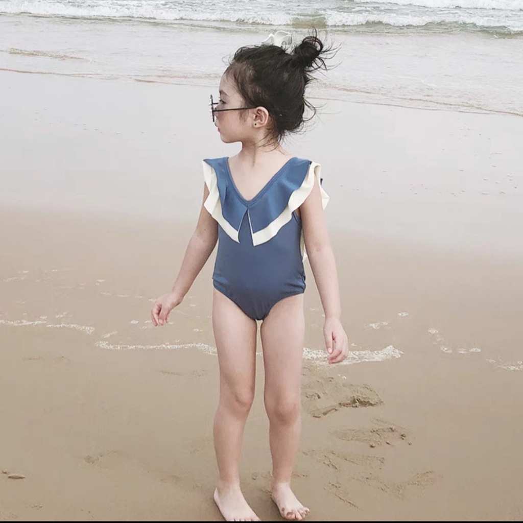 Đồ bơi bé gái liền thân cánh tiên cho bé đi biển