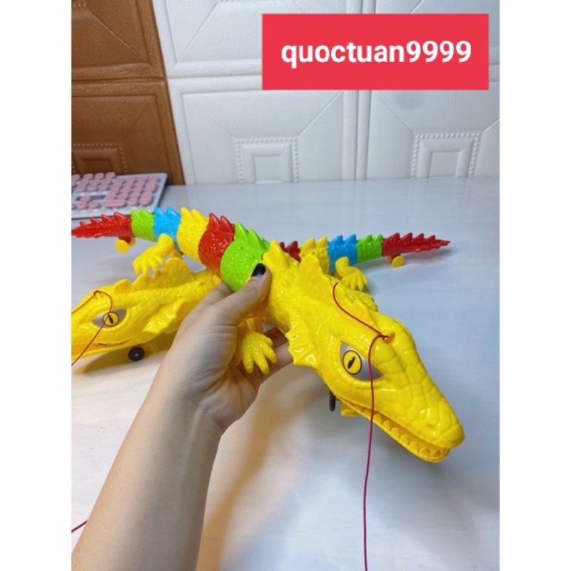 Đồ chơi con tắc kè bò phát nhạc và đèn kèm dây dắt,Đụng chướng ngại vật tự lùi