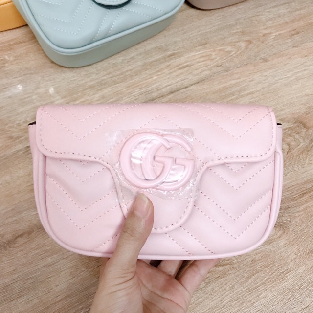 Túi mẫu xinh .dập.lót đỏ .dây đeo cùng màu túi