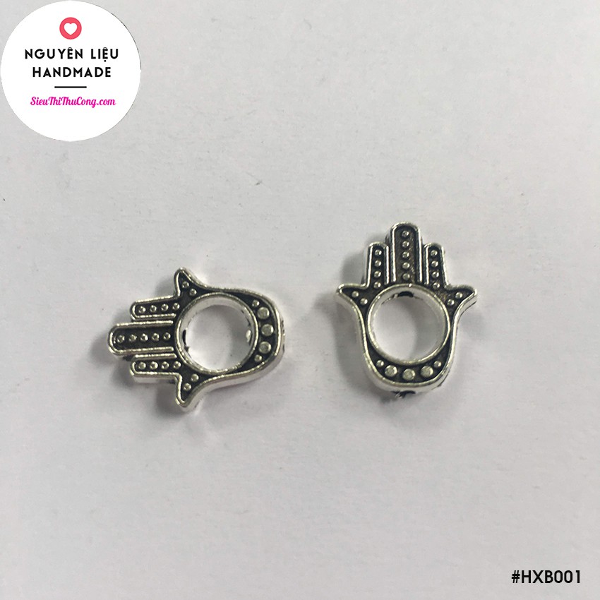 HXB001 - Mặt xi trắng hạt xỏ ngang bàn tay rỗng - Bịch 8 cái/10gr