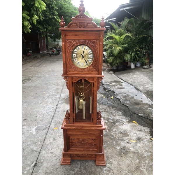 Đồng hồ gỗ hương đá kích thước cao 186 cm ngang 56 cm sâu 26 cm. máy sunny Hàn Quốc bảo hành 3 năm.