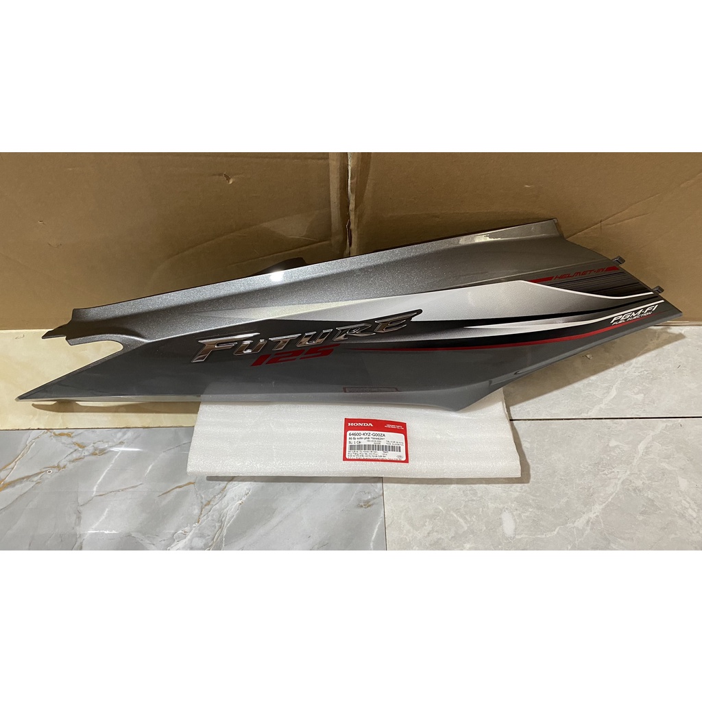Ốp sườn sau bên phải - ốp thân HONDA FUTURE 125 năm 2015 màu xám ghi. *NHA62M* 64600KYZG00ZA