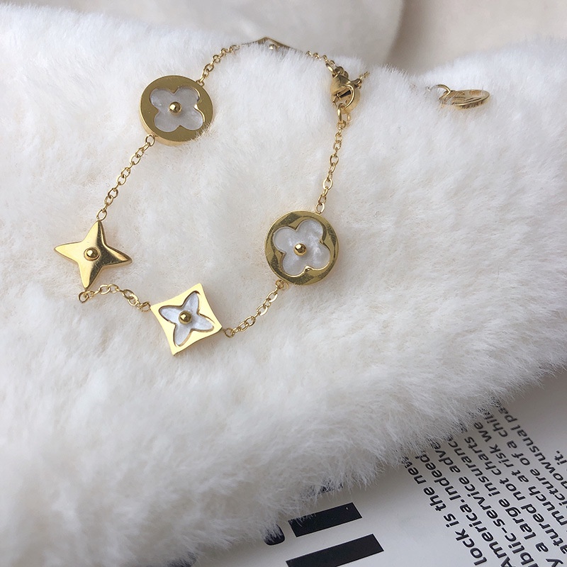 Vòng Tay Thép Titan Mạ Vàng 14K Mặt Cỏ Bốn Lá Thời Trang Hàn Quốc