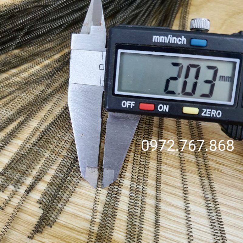 Lò xo nén 2*0.25*200mm