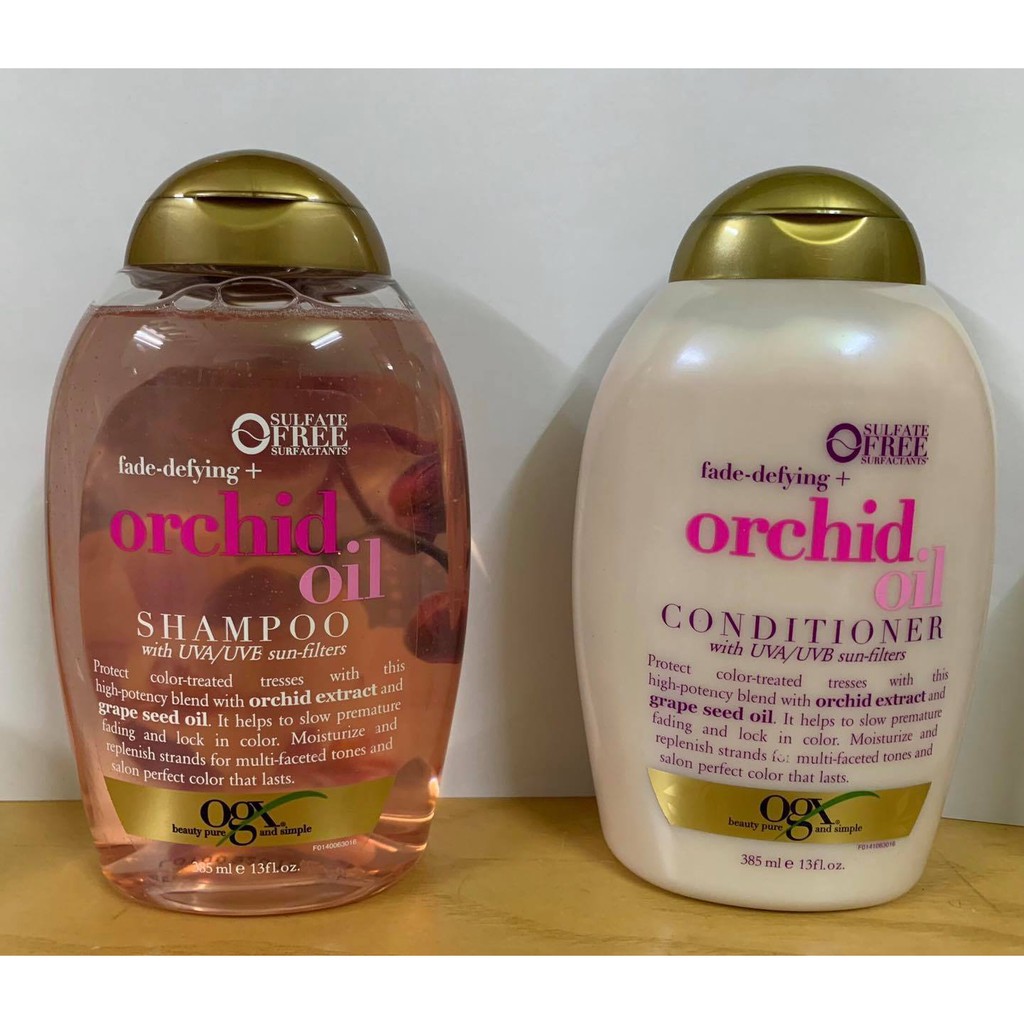 Dầu gội và dầu xả Ogx FadeDefying Orchid Oil 385ml Dành cho tóc nhuộm