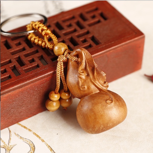 Móc khóa hình trái bầu bàng gỗ xịn đẹp chống nước - moc khoa xe