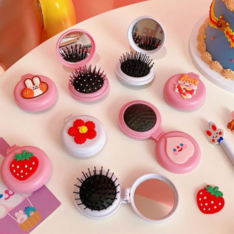 Gương kèm lược matxa tròn