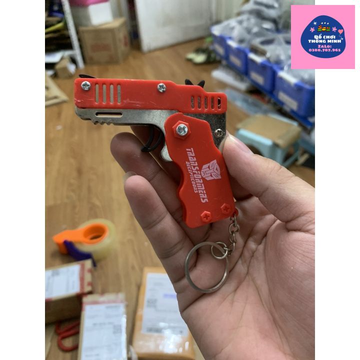 Đồ chơi trẻ em, Móc khóa Hình Súng, Có thể gấp lại, Bắn dây thun, Tặng Sẵn Dây Thun, Nịt quà tặng sinh nhật cho bé