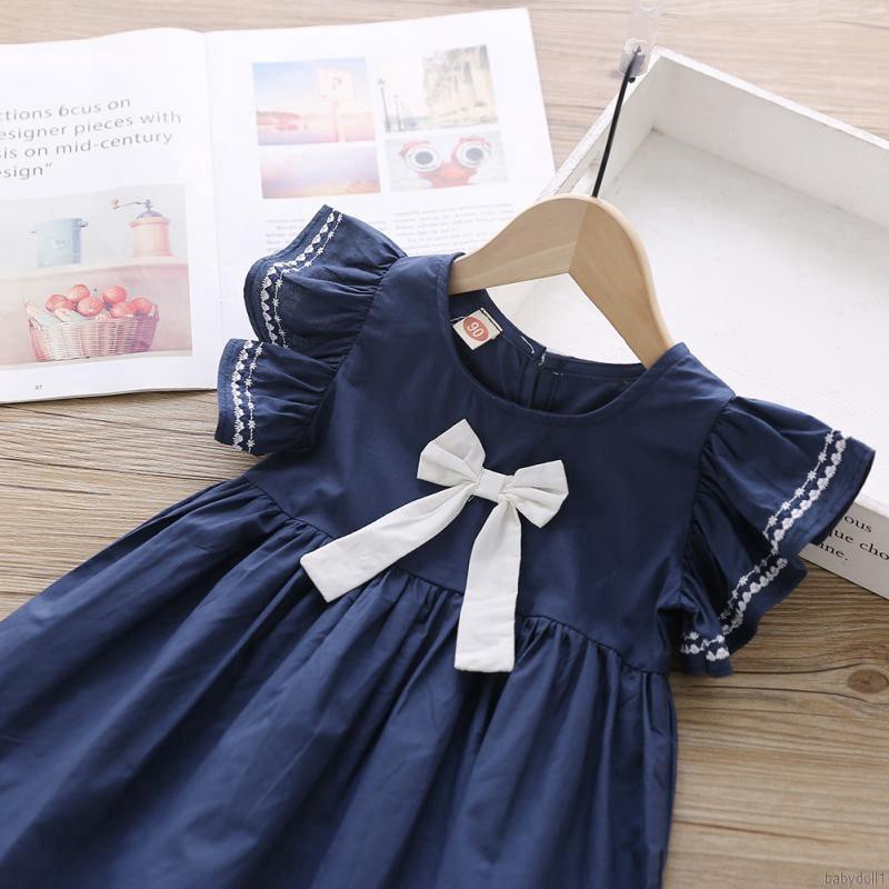 Đầm bé gái thắt nơ dễ thương xinh xắn