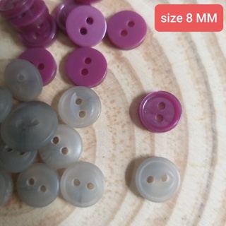 Nút nhựa 2 lỗ , size 8 mm