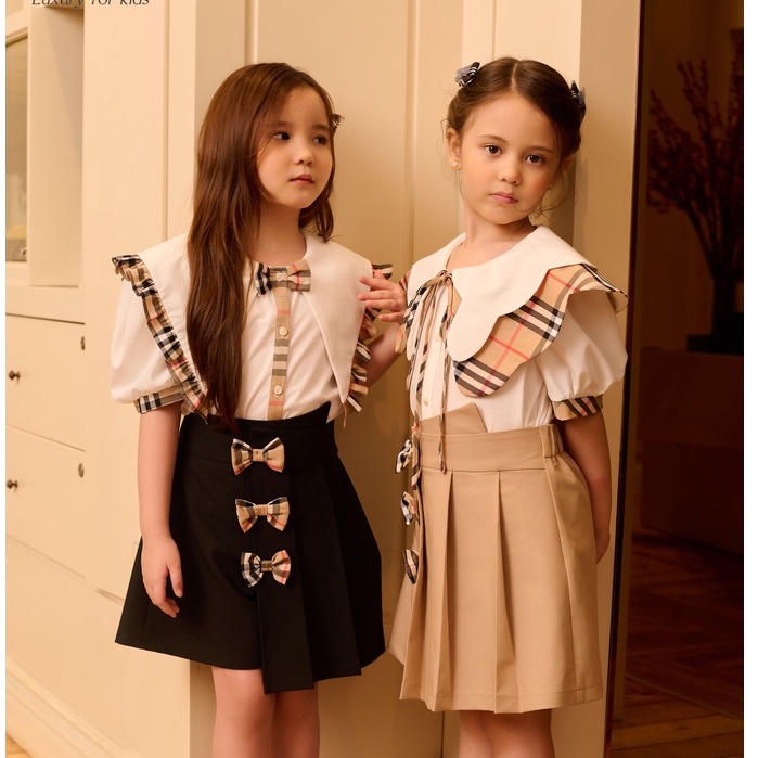 Chân váy xếp ly dáng A bé gái 137Kids thiết kế kèm nơ dễ thương cạp chun co giãn