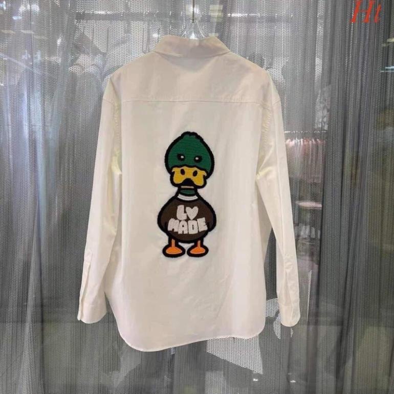 Áo sơ mi trắng dài tay vịt mũ xanh Ht