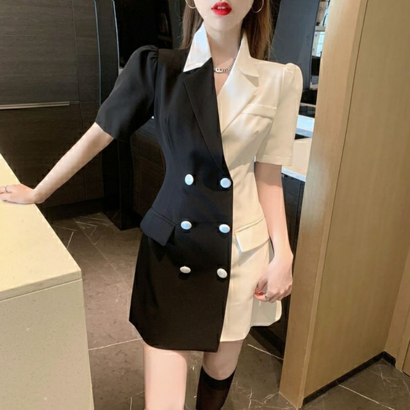 Váy đầm cổ vest cách điệu hai màu đen trắng. Váy đầm vest tay ngắn hai nửa khác màu.