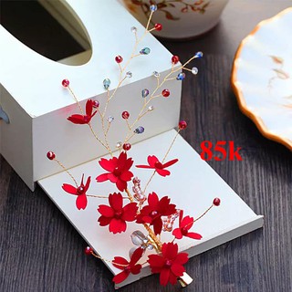 cài tóc hoa đỏ