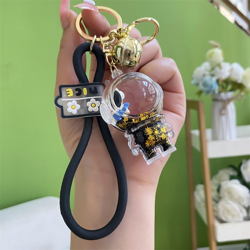 Móc Khóa Xe Hơi Hình Phi Hành Gia Bằng Acrylic Màu Vàng Đen Sáng Tạo