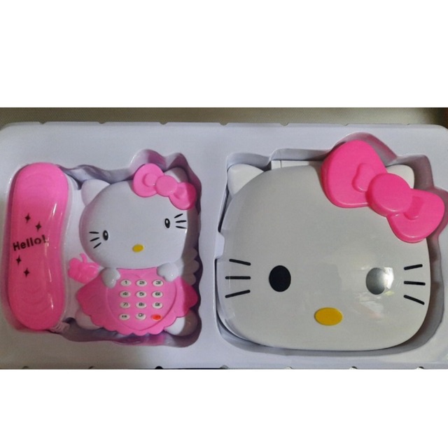 Hộp đàn laptop giúp bé nghe hoc tiếng anh và chiếc điện thoại bàn hello kitty