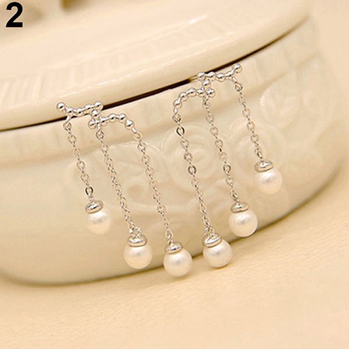 Khuyên tai dáng dài phối tua rua ngọc trai thanh lịch