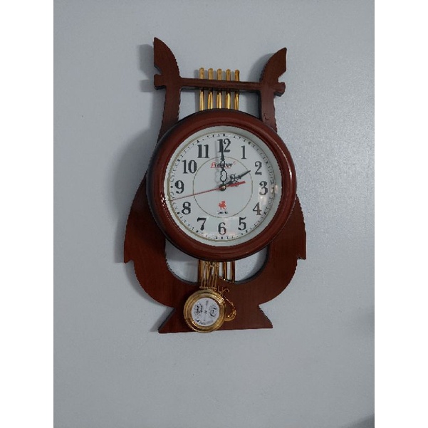 Đồng hồ quả lắc hình cây đànkt 60×40×5cm